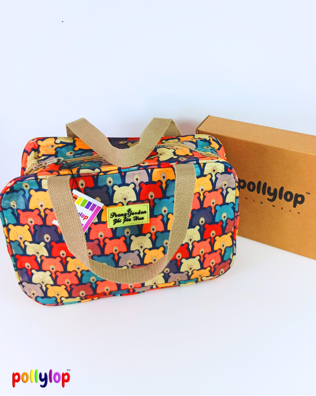 Colorful patterned bag with brown handles and a matching box on a white background, featuring the Pollylop brand.