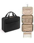 Black travel bag and beige hanging organizer on a white background