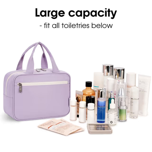 Purple toiletry bag with various skincare products on a white background