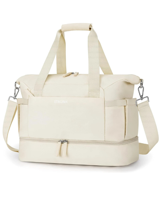 Beige duffel bag with multiple straps on a white background