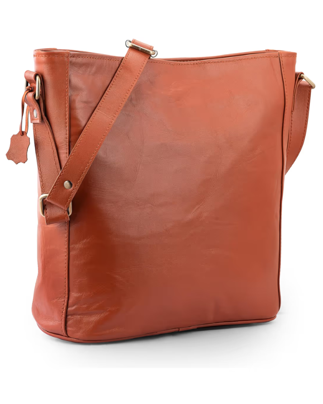 Brown leather tote bag with a shoulder strap on a white background