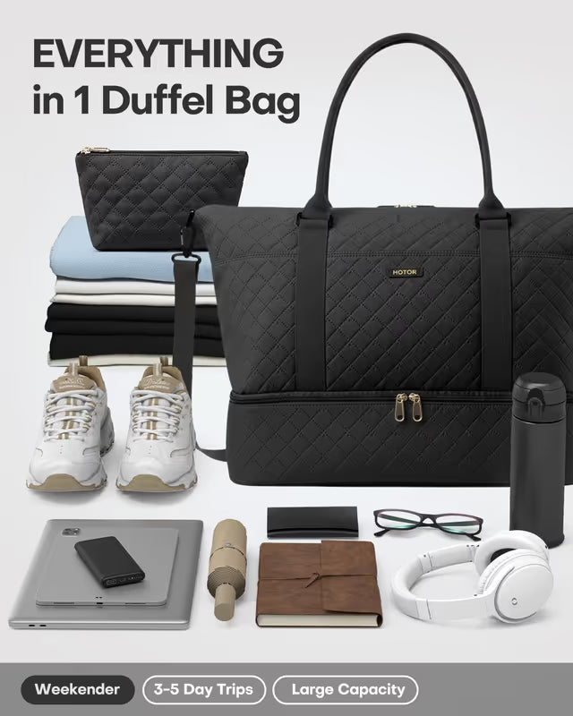 Black duffel bag with various travel items on a white background