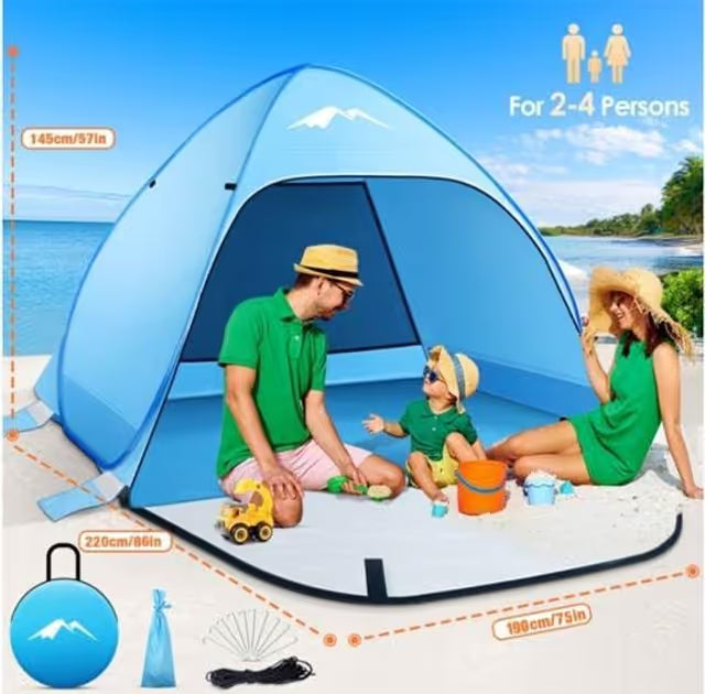 Family sitting outside a blue and white tent on a beach