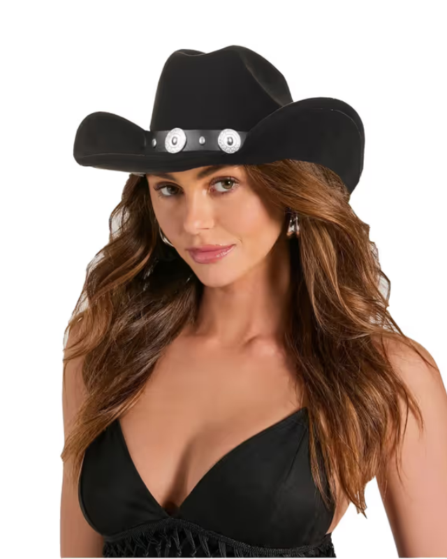 Woman wearing a black cowboy hat with white buttons on a white background