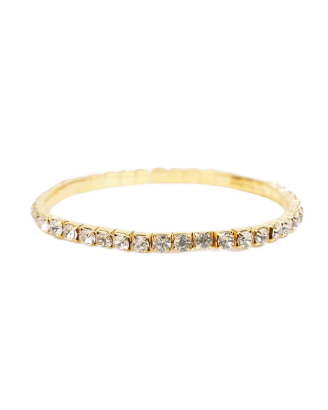 Gold bracelet with small diamonds on a white background