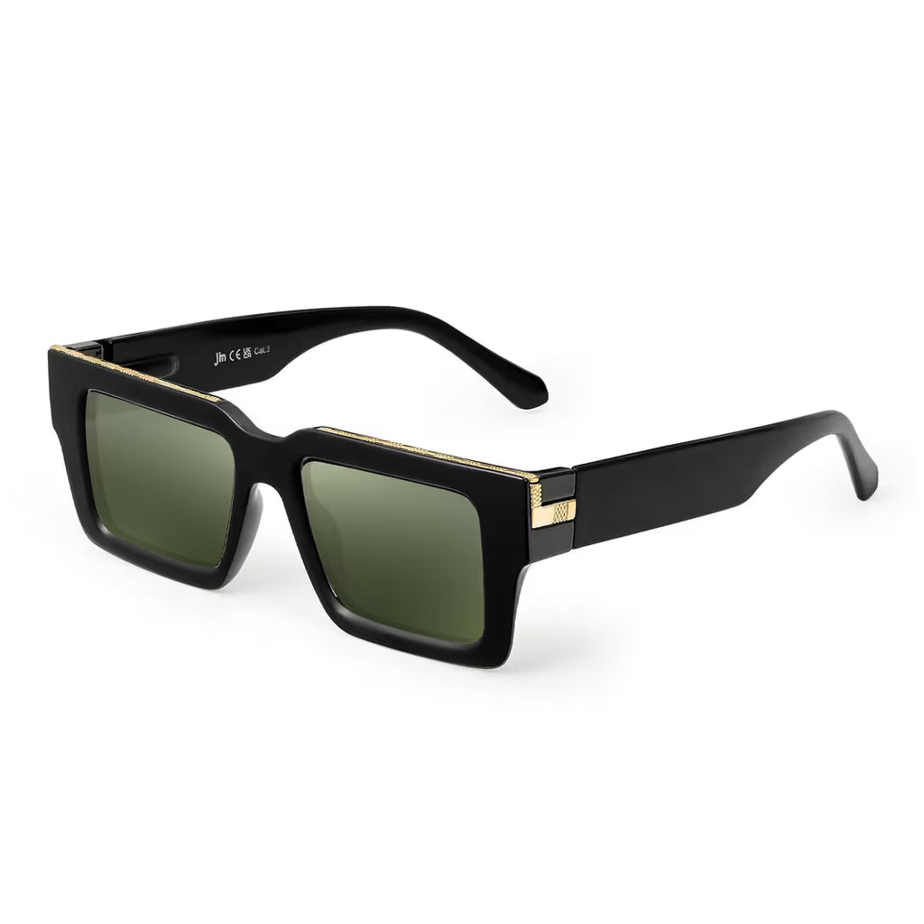 Black sunglasses with gold accents on a white background