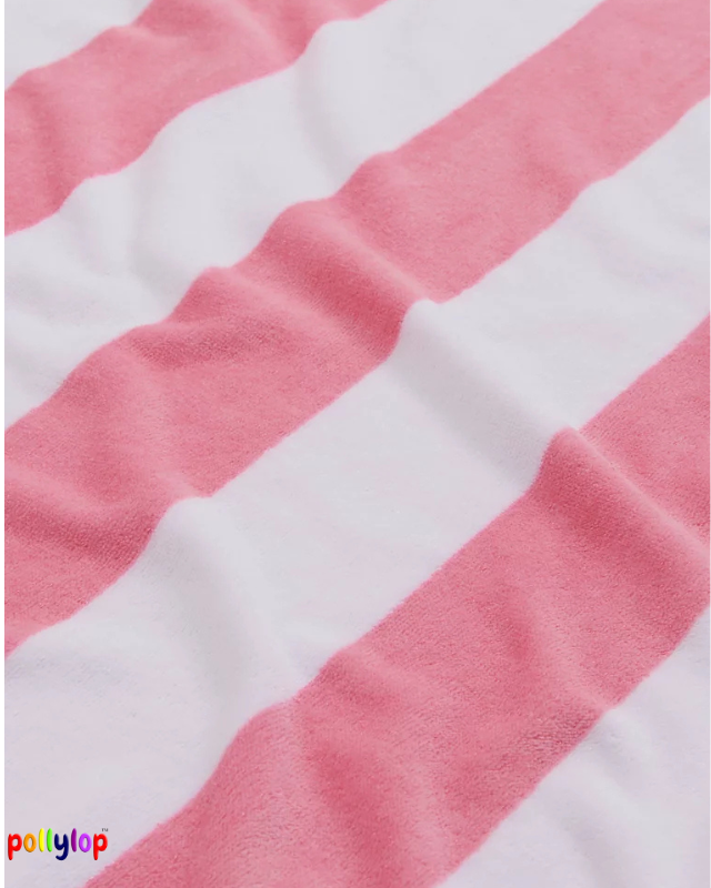 Black and white striped beach towel on white background
