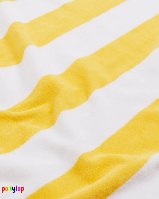 Yellow and white striped beach towel on white background