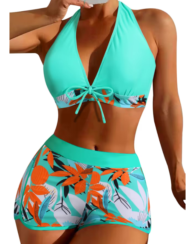 Teal bikini set with floral pattern on a white background
