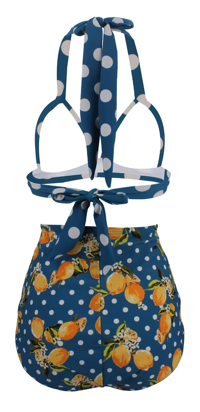 Blue polka dot bikini with orange patterned bottom on a white background