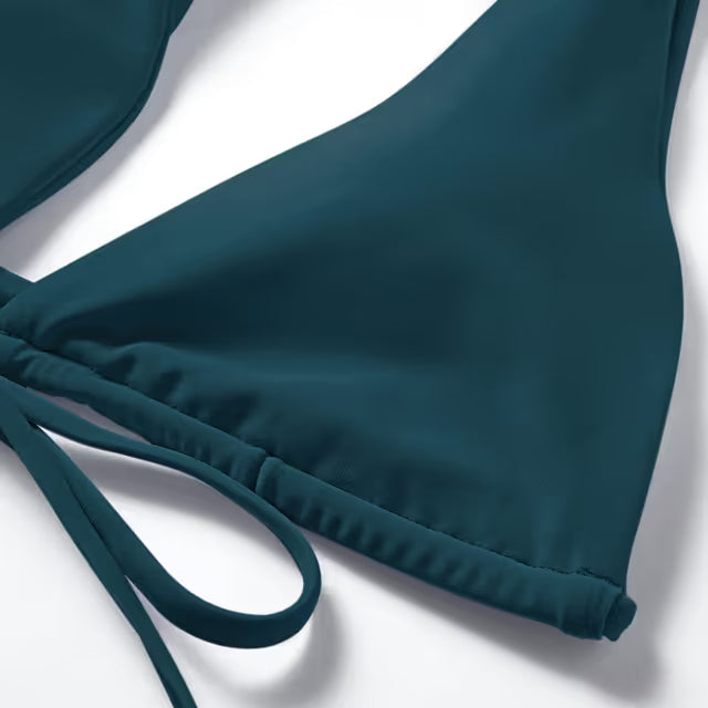Teal bikini on white background