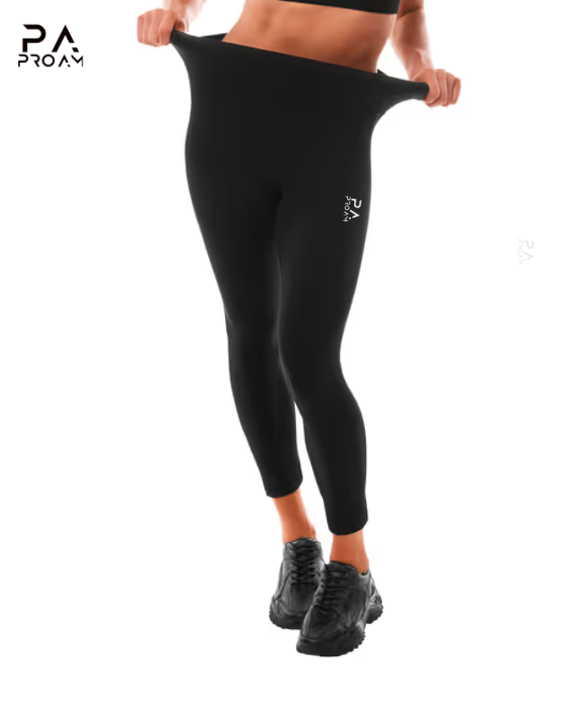 Person wearing black leggings with a visible brand logo on a white background