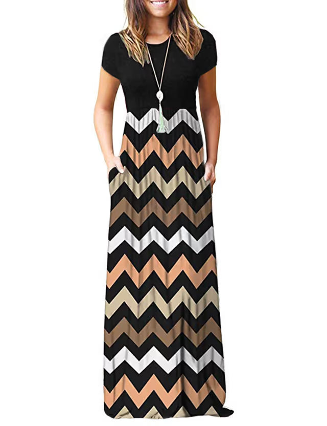 Woman wearing a black dress with a colorful zigzag pattern on a white background