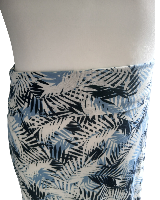 Maxi-Skirt with leaf pattern on a mannequin against a white background