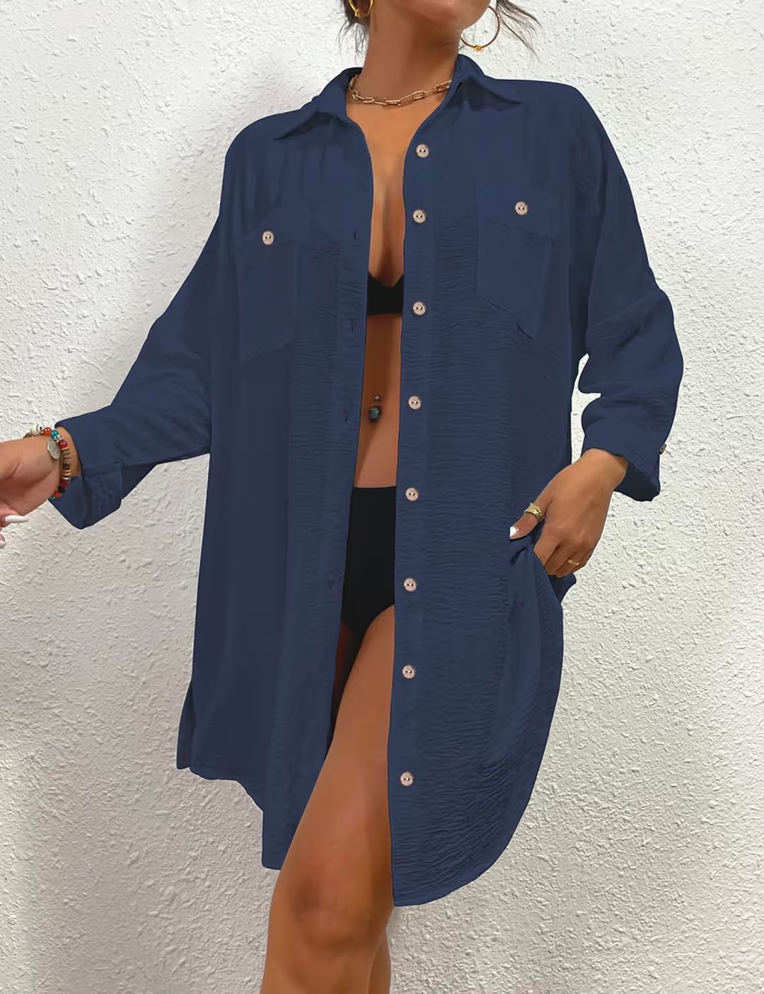 Woman in blue summer cover-up dress on white background