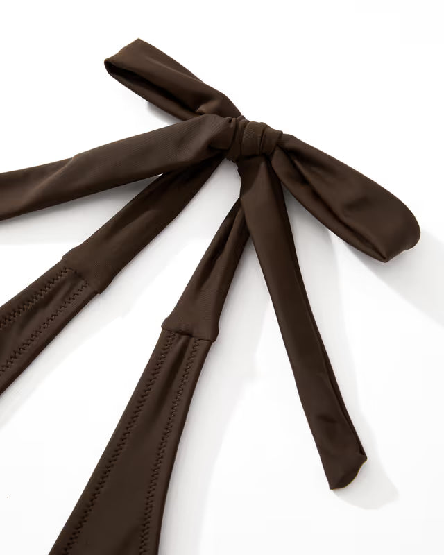 Tie halter neck detail on a swim-suit