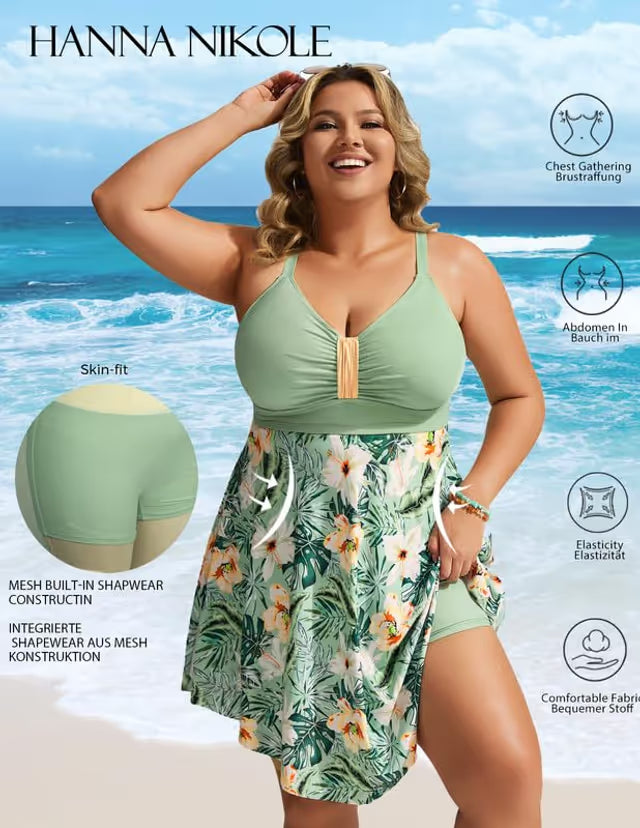 Woman in green swim-dress on beach background