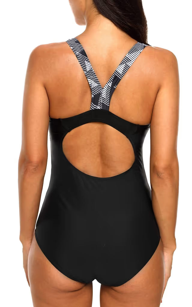 Black swimsuit with open back design on a white background