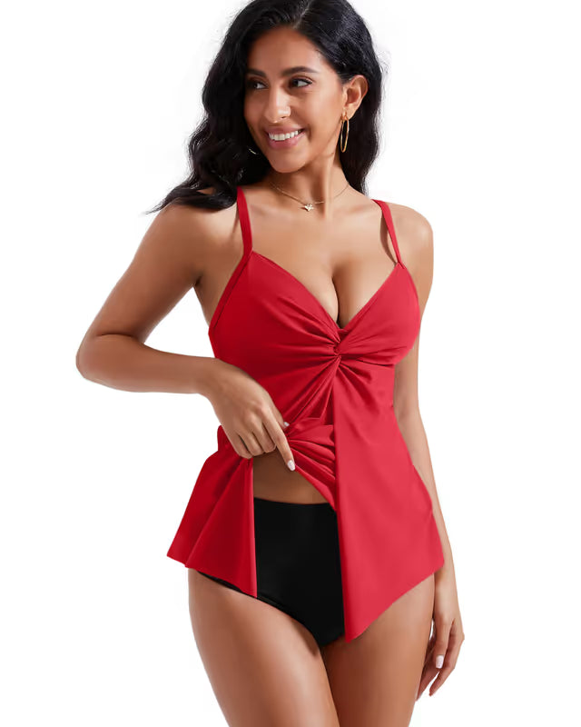 Woman wearing a red and black two-piece swimsuit on a white background