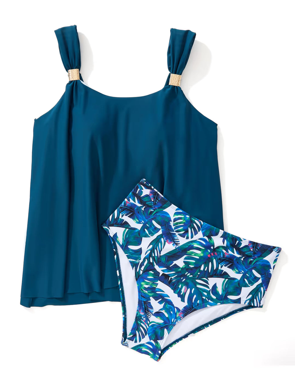 Blue tank top and tropical leaf patterned shorts on a white background