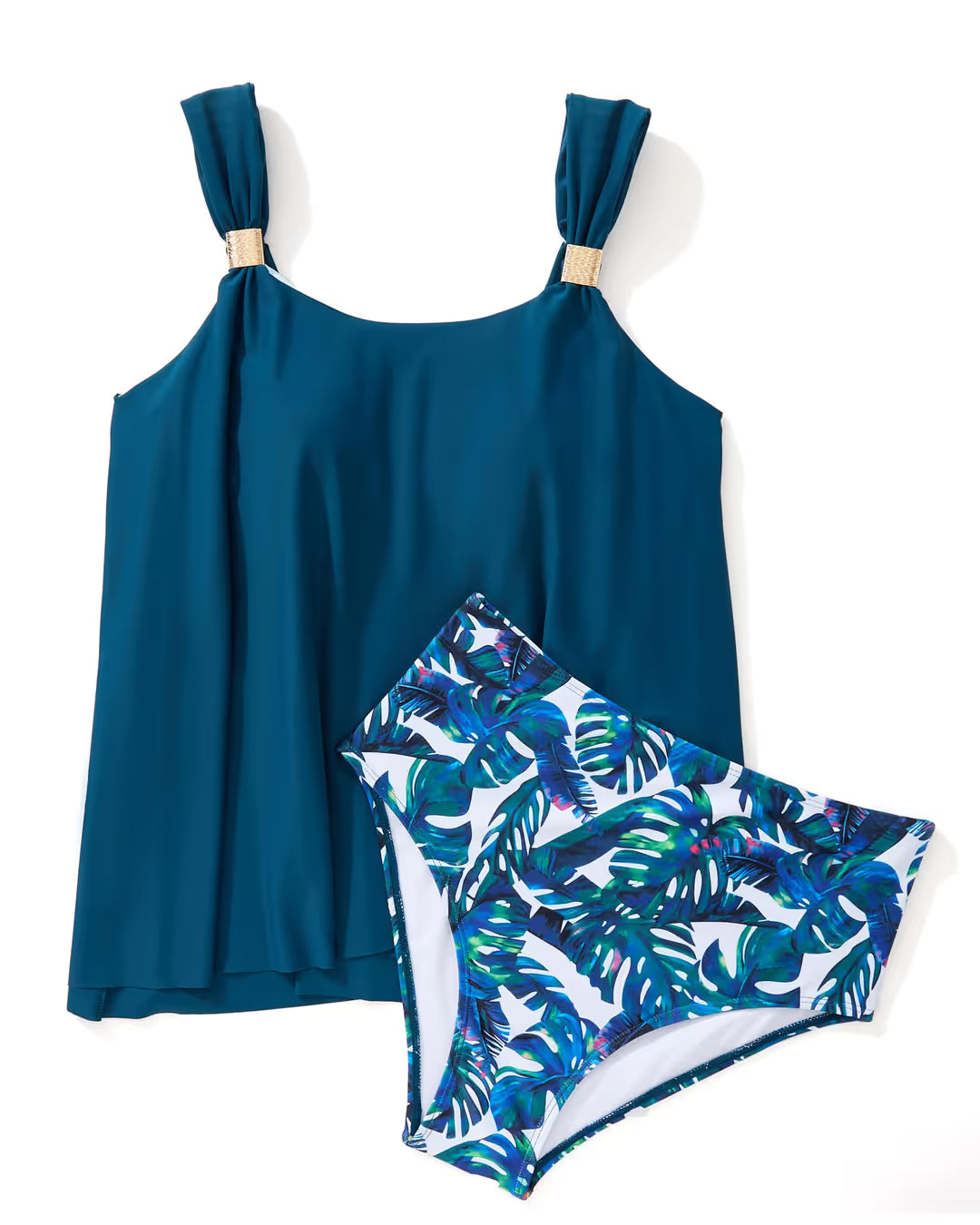 Blue tank top and tropical leaf patterned shorts on a white background