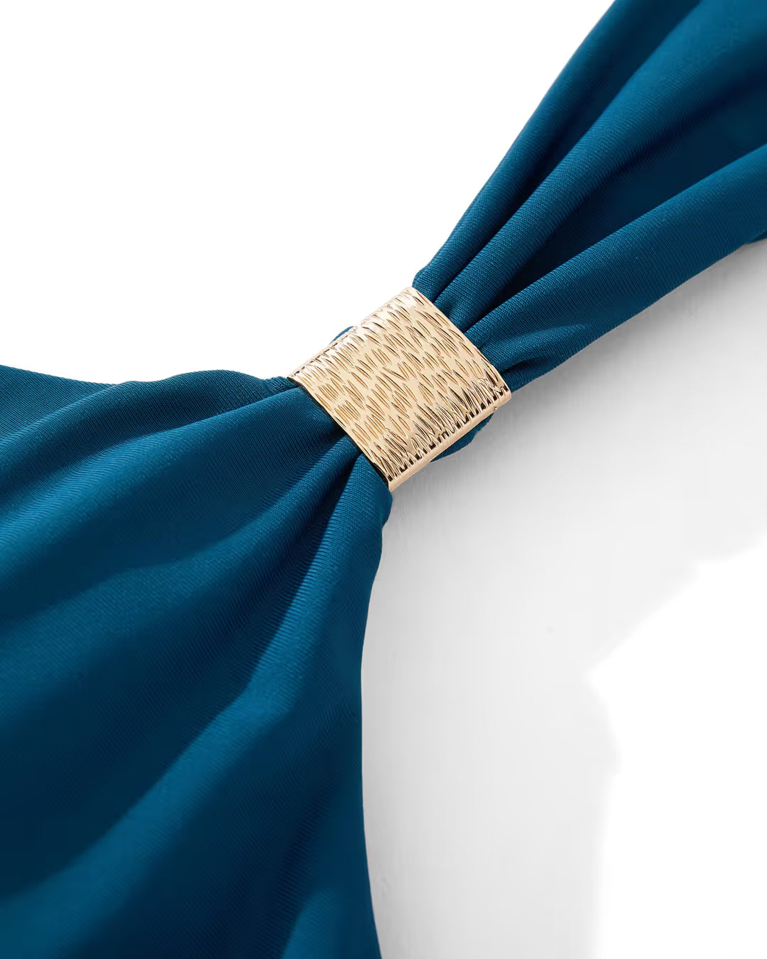 Blue fabric with a gold band on a white background
