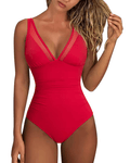 Red swim-suit with mesh panels worn by a model on a white background